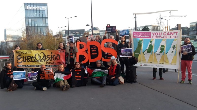 Activists protest outside French public television headquarters in Paris, 30 November, urging the broadcaste...                    </div>

    <div class=